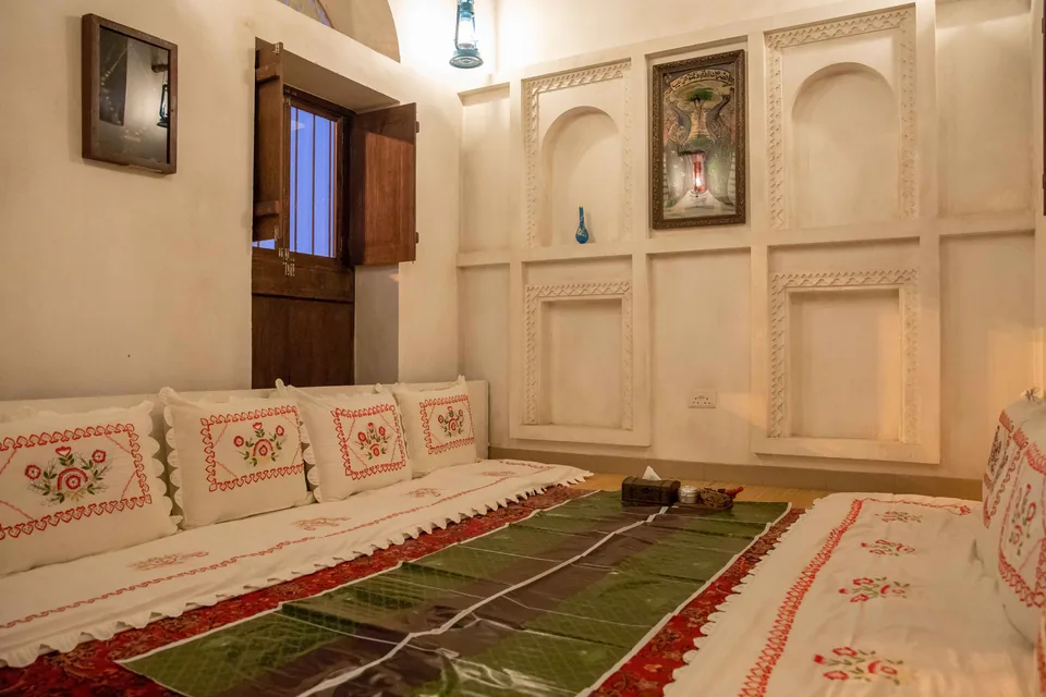 Majlis-style floor seating with cushions at Al Fanar Al Ain